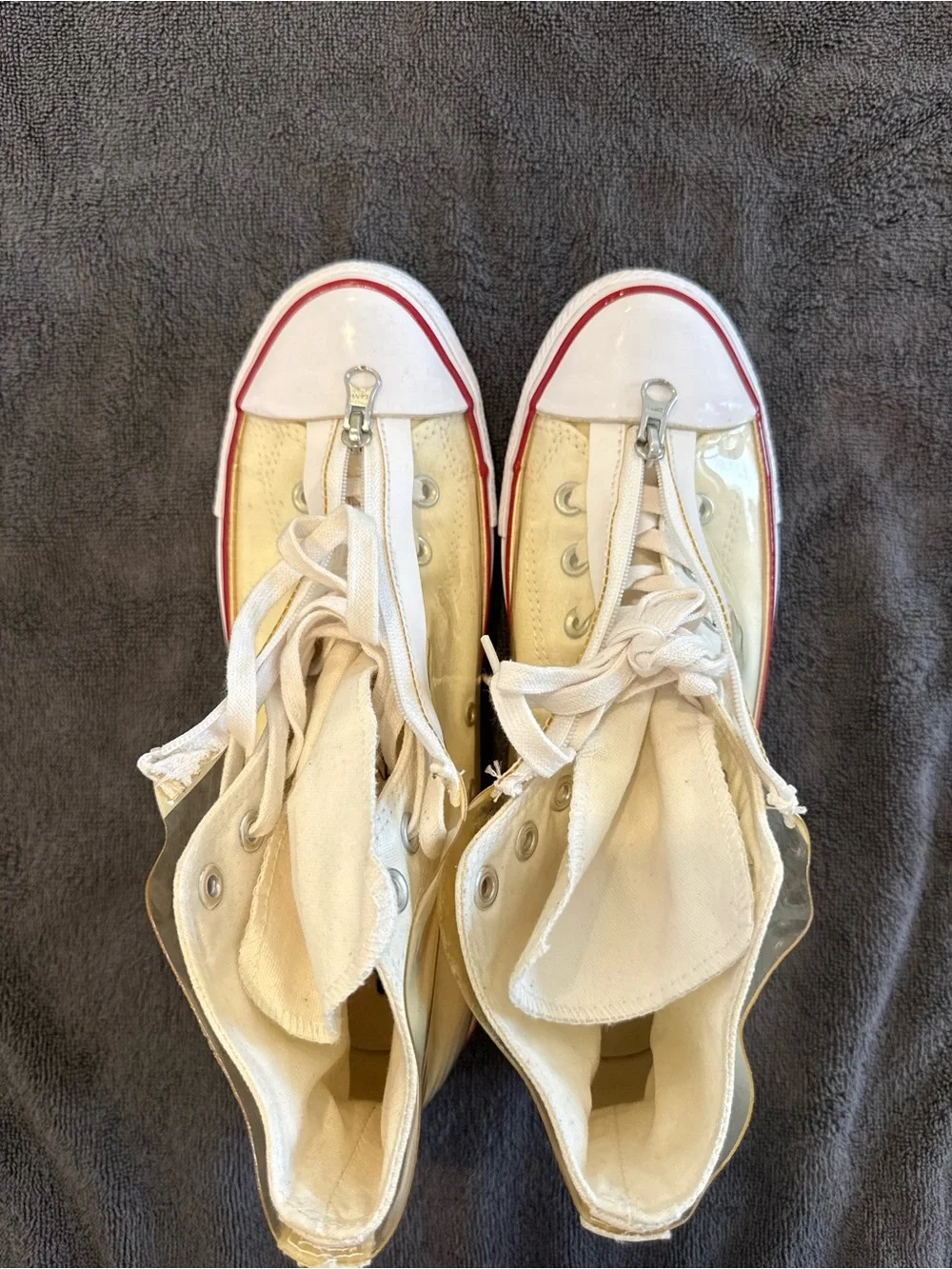Converse white High Top Sneakers with vinyl zip cover.